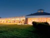 Catigny-academy-building-night-1536x768